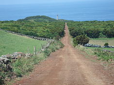 The single track dirt road to the lighthouse of Ponta dos Rosais, Portugal – Best Places In The World To Retire – International Living